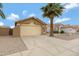 A comfortable one-story home featuring a two-car garage and desert landscaping at 881 W Saragosa St, Chandler, AZ 85225