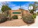 Community entrance sign amidst desert vegetation, displaying 'Scottsdale Vista North Townhomes' at E. Redfield Rd at 9039 E Winchcomb Dr, Scottsdale, AZ 85260