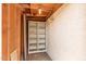 Unfinished storage area with shelving, providing ample space for organizing household items at 9039 E Winchcomb Dr, Scottsdale, AZ 85260