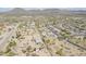 Neighborhood aerial showing the backs of houses, large lots, and community features at 907 N Mountain Rd, Mesa, AZ 85207