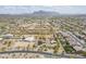 Neighborhood and beautiful mountain views from the air, showcasing expansive desert landscape at 907 N Mountain Rd, Mesa, AZ 85207