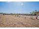 Extensive backyard with wood mulch ground cover featuring desert landscaping at 907 N Mountain Rd, Mesa, AZ 85207