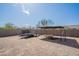 Backyard featuring a trailer and covered structure against a walled yard at 907 N Mountain Rd, Mesa, AZ 85207