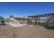 Backyard area featuring a fire pit and gravel landscaping at 907 N Mountain Rd, Mesa, AZ 85207