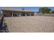 Single-story home featuring a covered patio and gravel landscaping at 907 N Mountain Rd, Mesa, AZ 85207