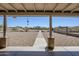 Covered patio with expansive backyard area, offering ample space for outdoor activities and relaxation at 907 N Mountain Rd, Mesa, AZ 85207
