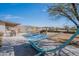 Inviting backyard with a cozy hammock, patio furniture, a barbecue grill, and scenic views at 907 N Mountain Rd, Mesa, AZ 85207
