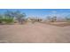 Spacious backyard showing a home surrounded by the desert landscape at 907 N Mountain Rd, Mesa, AZ 85207
