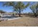 Outdoor patio with a hammock and firepit at 907 N Mountain Rd, Mesa, AZ 85207