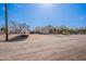 Spacious single-story home with a well-maintained front yard and an RV in the drive at 907 N Mountain Rd, Mesa, AZ 85207