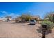 Single-story home featuring desert landscaping, a two-car garage, and an RV on the property at 907 N Mountain Rd, Mesa, AZ 85207