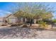 Well-maintained single-story home featuring desert landscaping and a welcoming front entrance at 907 N Mountain Rd, Mesa, AZ 85207