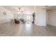 Spacious living room with vaulted ceilings, tile floors, and a comfortable seating area at 907 N Mountain Rd, Mesa, AZ 85207