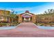 Beautiful community center entrance with stonework, landscaping, and inviting walkway at 10350 E Texas Ave, Mesa, AZ 85212