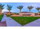Encore community entrance with lush landscaping and modern design, welcoming residents and guests at 10350 E Texas Ave, Mesa, AZ 85212
