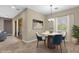 Cozy breakfast nook features modern pendant lighting and a bright window at 10350 E Texas Ave, Mesa, AZ 85212