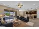 Bright living room opens to outdoor patio, seamlessly blending indoor and outdoor living spaces at 10350 E Texas Ave, Mesa, AZ 85212