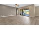 Bright living space featuring sliding glass doors offering seamless indoor-outdoor transition at 10350 E Texas Ave, Mesa, AZ 85212