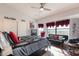Bright bedroom with modern décor, ceiling fan, and a window with scenic views at 1234 E Claire Dr, Phoenix, AZ 85022