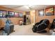 Bonus Room features exercise equipment, massage chair and framed artwork at 1234 E Claire Dr, Phoenix, AZ 85022