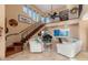 Grand foyer featuring a staircase, high ceilings, and elegant decor at 1234 E Claire Dr, Phoenix, AZ 85022