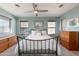 Comfortable main bedroom with three windows at 1234 E Claire Dr, Phoenix, AZ 85022