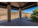 Stunning mountain views from this covered patio with iron railing and decorative columns at 1234 E Claire Dr, Phoenix, AZ 85022