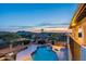 Enjoy breathtaking sunsets from the poolside of this luxurious home, complete with a covered patio and lush landscaping at 1234 E Claire Dr, Phoenix, AZ 85022