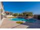 Stunning pool with surrounding patio and landscaped areas, ideal for relaxation and outdoor enjoyment at 1234 E Claire Dr, Phoenix, AZ 85022