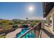 View of the backyard pool and mountain views from the balcony at 1234 E Claire Dr, Phoenix, AZ 85022