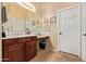Functional bathroom with a vanity, mirror, and ample counter space at 13155 W Monterey Way, Litchfield Park, AZ 85340