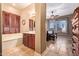Bright main bathroom features a soaking tub, shower, and vanity with ample counter space at 13155 W Monterey Way, Litchfield Park, AZ 85340