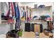 Spacious walk-in closet with organized shelving and ample storage for clothing and accessories at 13155 W Monterey Way, Litchfield Park, AZ 85340