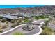 Scenic aerial view of a residential community nestled against the backdrop of picturesque mountains at 1341 E Paseo Way, Phoenix, AZ 85042