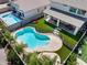 Backyard oasis with a refreshing pool, a covered patio, artificial grass, and secure fencing for Gathering fun at 14554 W Evans Dr, Surprise, AZ 85379