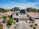 Charming two-story home with a two-car garage and solar panels for energy efficiency and curb appeal at 14554 W Evans Dr, Surprise, AZ 85379