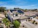 Charming two-story home with a two-car garage and solar panels for energy efficiency and curb appeal at 14554 W Evans Dr, Surprise, AZ 85379