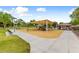 Community playground with swings, slides, and sun shade at 14554 W Evans Dr, Surprise, AZ 85379