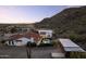 Estate with a pool, desert landscaping, a barn and mountain views at 1500 N Crismon Rd, Mesa, AZ 85207