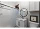 Bathroom features a vanity with a vessel sink and a glass-enclosed shower at 1500 N Crismon Rd, Mesa, AZ 85207