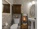 Charming powder room featuring unique crane wallpaper, ornate vanity, and decorative accents at 1500 N Crismon Rd, Mesa, AZ 85207