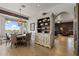 The dining area offers desert views and has a decorative hutch with a white finish at 1500 N Crismon Rd, Mesa, AZ 85207