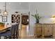 Spacious dining room with a light-filled, airy feel, hardwood floors, and elegant furnishing, perfect for gatherings at 1500 N Crismon Rd, Mesa, AZ 85207