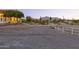 Wide driveway with elegant home, horse area, and mountain views at 1500 N Crismon Rd, Mesa, AZ 85207