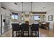 Spacious kitchen with modern appliances, large island, and bright windows offering scenic desert views at 1500 N Crismon Rd, Mesa, AZ 85207