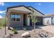 Charming single-story home featuring desert landscaping, neutral paint scheme, and a two-car garage at 18141 W Hiddenview Dr, Goodyear, AZ 85338