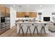 Spacious kitchen with a large island, stainless steel appliances, and ample cabinet space at 18141 W Hiddenview Dr, Goodyear, AZ 85338