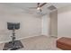 Bedroom with a cycling machine and ceiling fan at 1931 E Lantana Dr, Chandler, AZ 85286