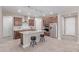 A kitchen featuring an island with granite countertops, stainless steel appliances, and dark wood cabinets at 1931 E Lantana Dr, Chandler, AZ 85286