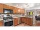 Updated kitchen with tile backsplash, stainless steel appliances, and eat-in breakfast bar at 19700 N 76Th St # 2101, Scottsdale, AZ 85255